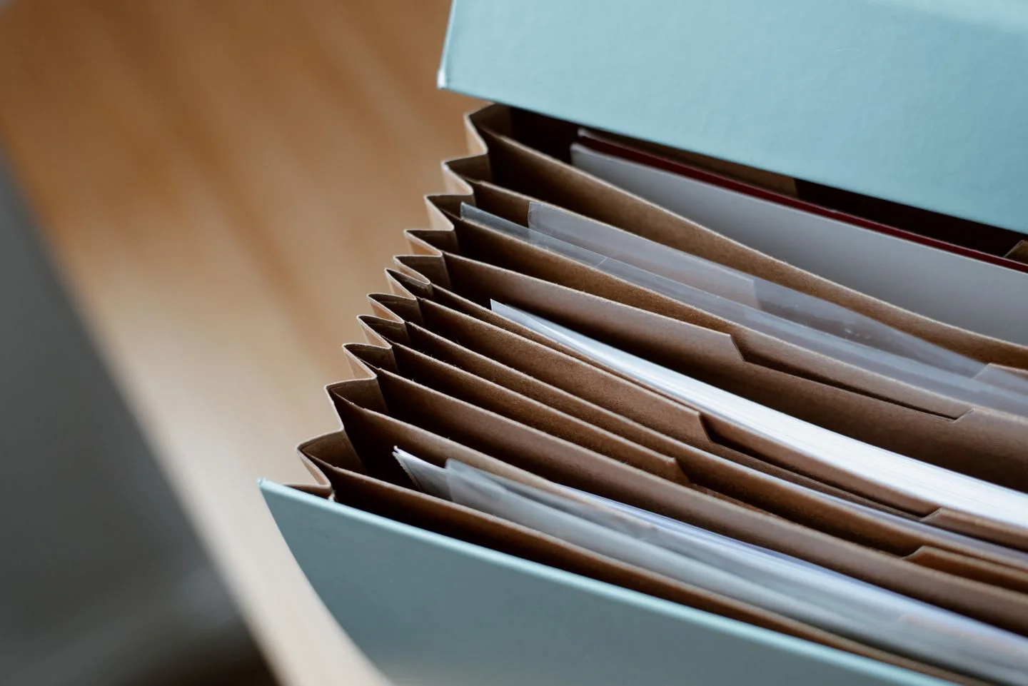 Open folder containing organized documents.