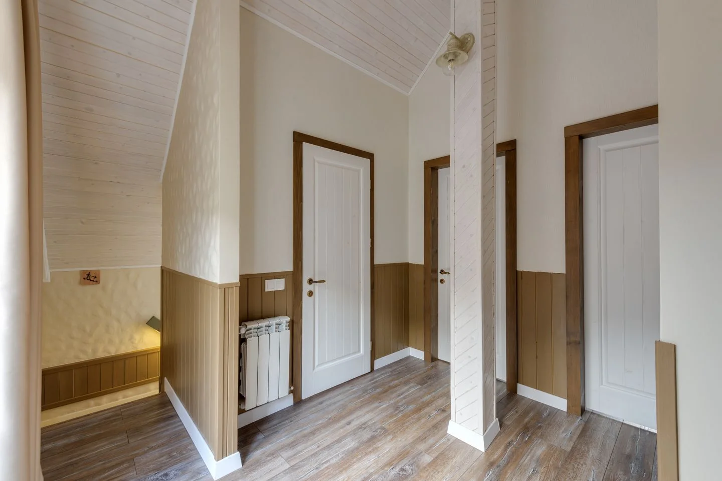 An empty corridor inside a wooden house