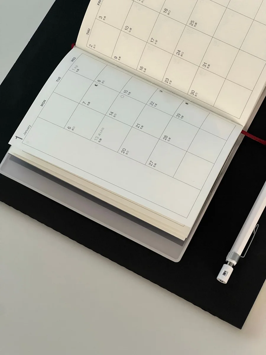 Calendar and pen